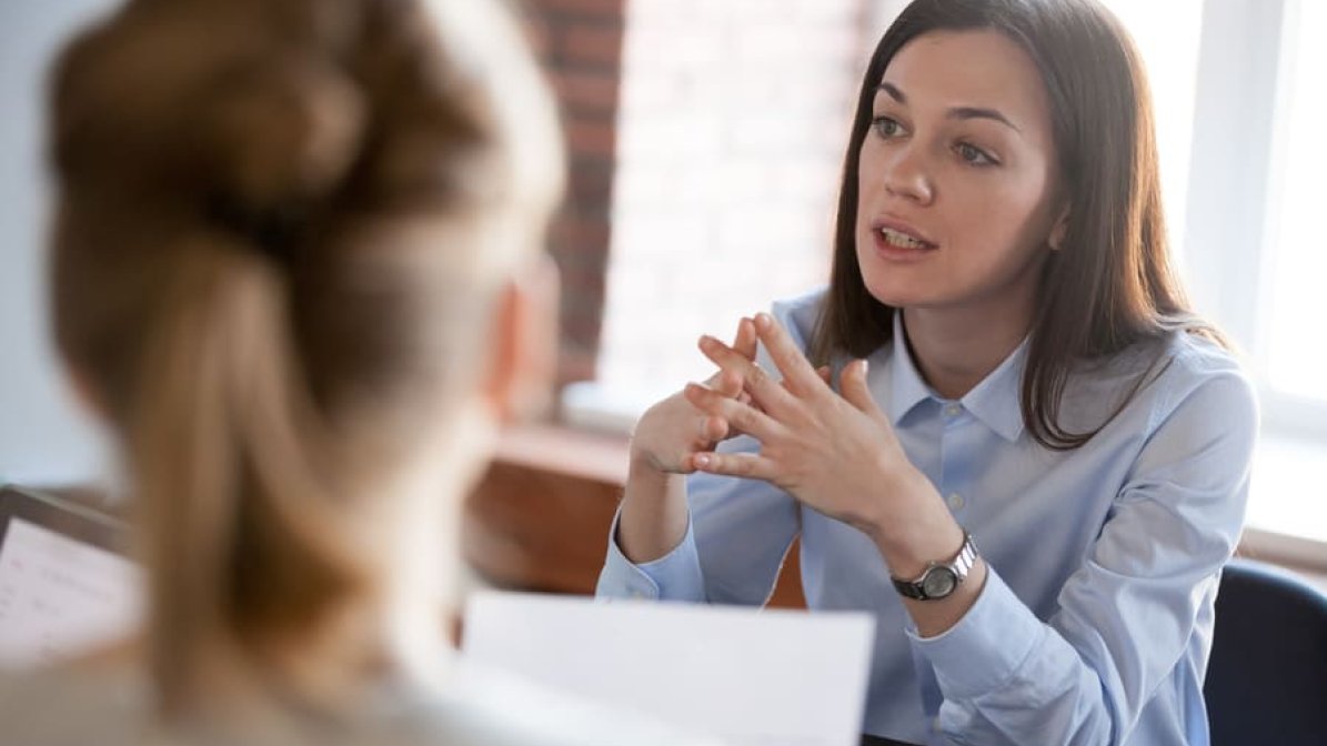 Employee talking to manager 