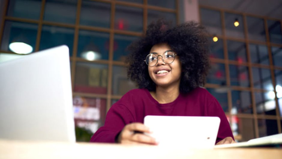 Law apprentice at work on laptop