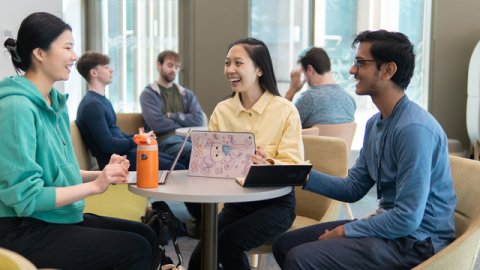 Students chatting in university communal area