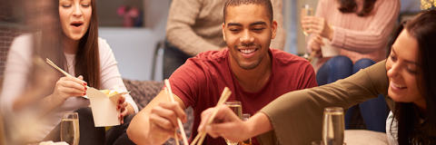 People eating with chopsticks